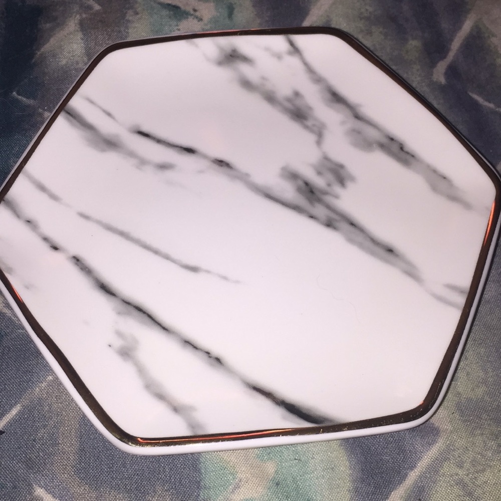 Pier 1 Imports soap or jewelry dish with gold rim.